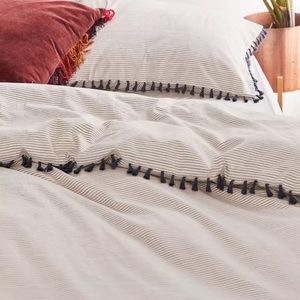 Urban Outfitters striped tassel bedding